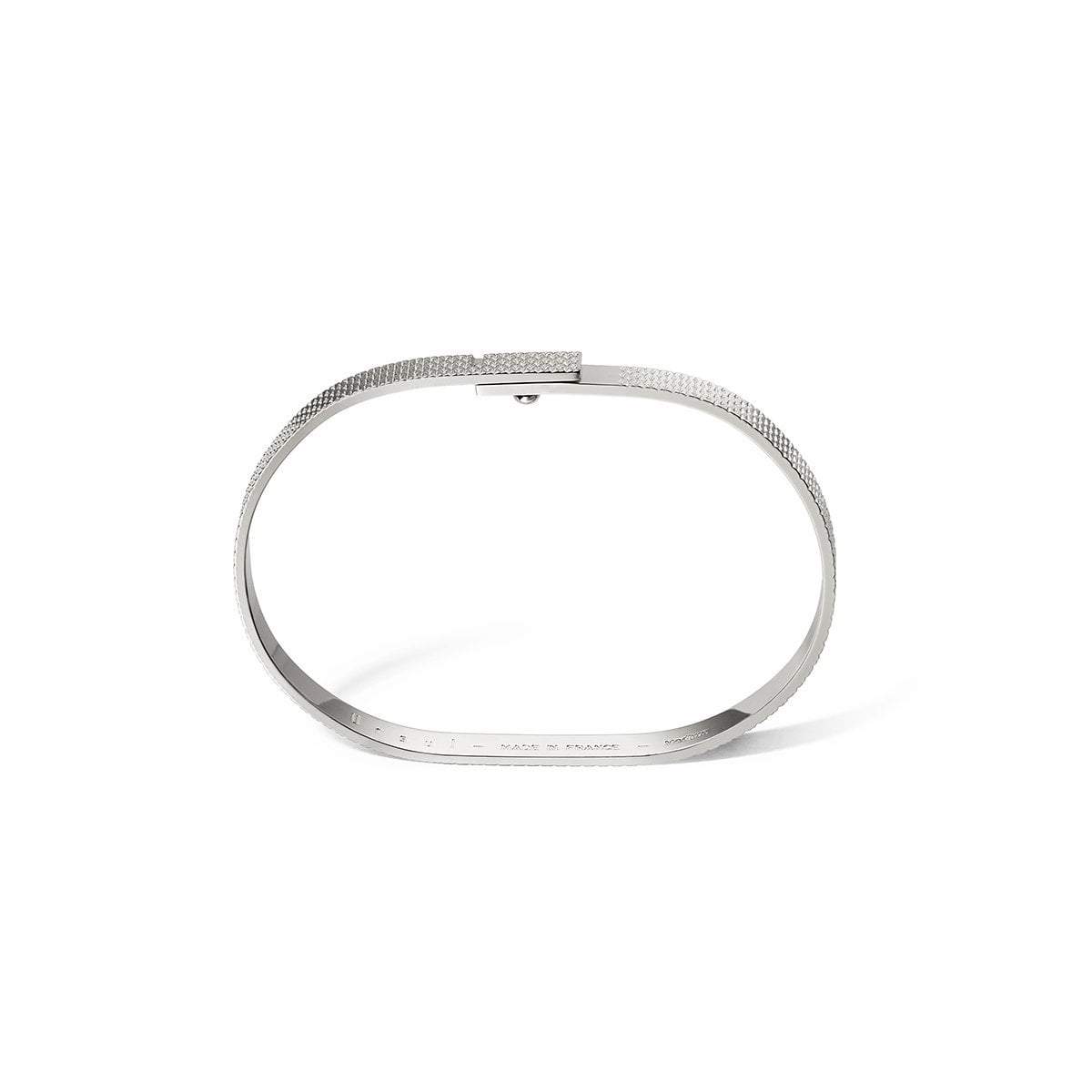 Vue du profil ovoïde du jonc Saturne.X argent motif guilloché Ursul